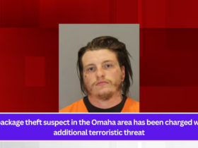 A package theft suspect in the Omaha area has been charged with additional terroristic threat