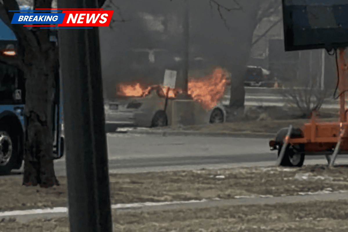 Omaha's mayor helps the driver of a burning car